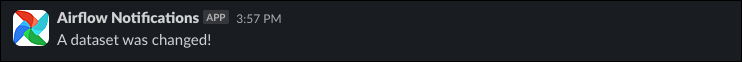 Screenshot of a Slack message sent by the webhook, saying &quot;A dataset was changed!&quot;.